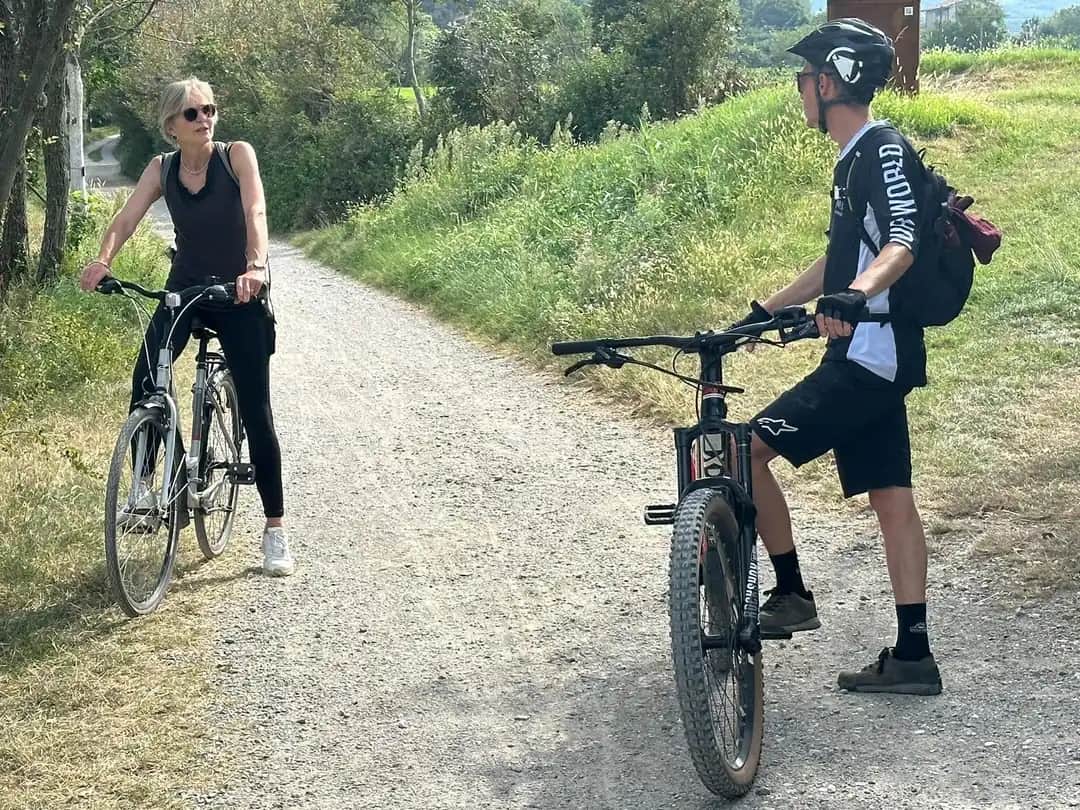 ORME guide on an e-bike tour with a guest on Lake Iseo